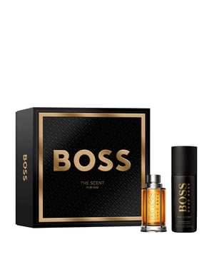 Elevate your gifting this holiday season with the HUGO BOSS BOSS The Scent For Him Eau de Toilette Gift Set. This elegant set is presented in a sleek black box adorned with amber-gold accents. The centerpiece, BOSS The Scent Eau de Toilette, captivates with its unique blend of exotic notes, including refreshing ginger, sweet passionfruit, and warm leather. The set also includes a BOSS The Scent Deodorant Spray, ensuring freshness throughout the day. Ideal for the modern man, this gift set embodies sophistication and charm.