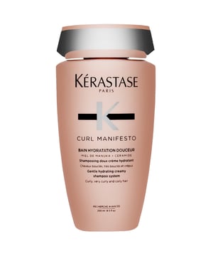 Discover Kérastase Curl Manifesto Bain Hydratation Douceur, a hydrating shampoo for curly and coily hair. Infused with Manuka Honey and Ceramide, it gently cleanses while removing impurities and product build-up. Enjoy revitalized, bouncy curls that enhance your natural curl pattern. For best results, apply a quarter-sized amount to wet hair, focusing on the scalp before rinsing. Kérastase is committed to sustainability, using recycled materials and achieving carbon neutrality in production.