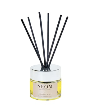 Experience tranquility with the Neom Wellbeing London Complete Bliss Reed Diffuser, designed to promote calm and relaxation. Infused with a blend of 17 pure essential oils, including Moroccan Blush Rose and Lime, this diffuser fills your home with a delightful fragrance and eases tension. Neom's natural fragrances help relieve stress and prepare for restful sleep. Lasting over 12 weeks, it's easy to use—simply insert the reeds and enjoy the soothing aroma. Elevate your self-care routine with this calming scent.