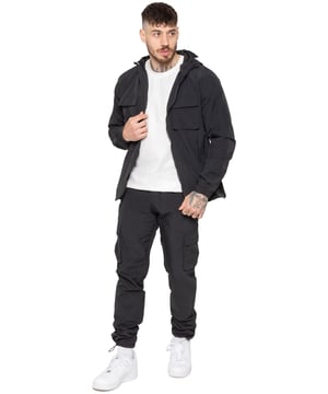 Gear up with the Enzo Milano Men’s Lightweight Cargo Jacket & Pants Set, built for comfort, function, and style. The jacket features water-repellent crushed poly fabric with a breathable mesh lining, full zip front, adjustable hood, and multiple secure pockets. Paired with lightweight cargo pants in a regular fit, this set includes an elasticated waistband with drawstring, cargo pockets, and adjustable hems for a personalized fit.