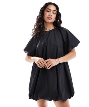 Dresses by ASOS DESIGN Low effort, high reward Plain design Round neck Puff sleeves Button-keyhole back Regular fitSold By: Asos