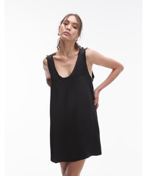 Dresses by Topshop This is Topshop Scoop neck Sleeveless style Tie-back fastening Relaxed fitSold By: Asos