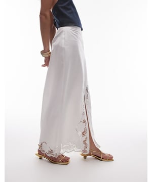 Skirts by Topshop This is Topshop Mid rise Cutwork detail Front split Regular fitSold By: Asos