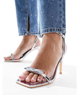 Shoes by Glamorous Give your feet some airtime Adjustable strap Pin-buckle fastening Bow detail Open toe Stiletto heelSold By: Asos