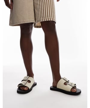 Shoes by Topshop This is Topshop Adjustable strap Pin-buckle fastening Open toe Flat soleSold By: Asos