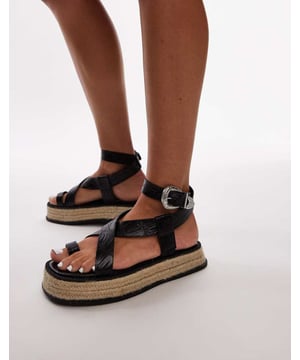 Shoes by Topshop Step into summer Adjustable strap Pin-buckle fastening Toe loop Open toe Cross strap Woven mid-sole Chunky soleSold By: Asos