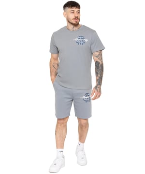 Step up your casual style with the Enzo Milano Men's Printed T-Shirt & Shorts Set. The regular-fit tee features bold "Members Only" puff prints on the front and back, with a ribbed crew neck for comfort and style. The matching fleece-lined shorts offer a relaxed fit, adjustable drawstring waist, and side pockets, finished with a striking puff print on the leg. Perfect for everyday wear with a modern streetwear edge.