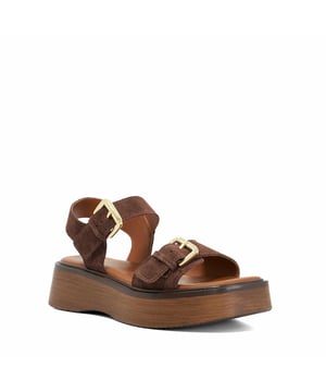 Crafted from premium materials, the upper of this square-toed silhouette features wide straps with large buckles. Set on a flatform sole, this versatile sandal pairs equally well with everything from denim to sundresses and is finished with a lined footbed that promises all-day comfort.