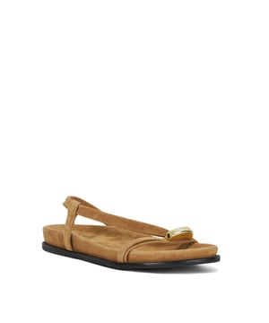 This asymmetric sandal with gold toe trim has been crafted with a supportive footbed. Resting on a flexible rubber sole this minimal style will be your warm weather go-to.