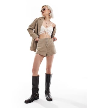 Shorts by Reclaimed Vintage Short cut to summer style High rise Lace-up front Front pockets Regular fitSold By: Asos