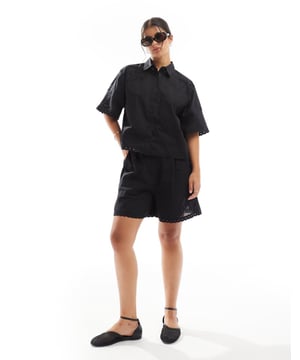 Shorts by ASOS DESIGN Part of a co-ord set Top sold separately High rise Stretch-back waistband Side pockets Cut-work detail to hem Regular fitSold By: Asos