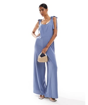 Jumpsuits & Playsuits by ASOS DESIGN Thanks, it's ASOS Scoop neck Tie straps Zip-back fastening Wide leg Regular fitSold By: Asos
