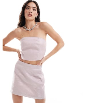 Tops by Pieces Part of a co-ord set Skirt sold separately Glitter finish Bandeau style Shirred, stretch panel to back Cropped lengthSold By: Asos