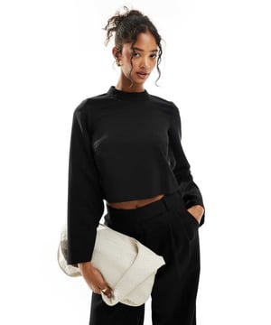 Tops by Closet London Part of a co-ord set Bottoms sold separately High neck Long sleeves Button-keyhole back Cropped length Regular fitSold By: Asos