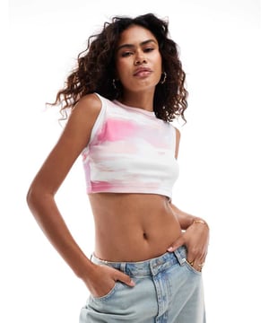 Tops by Calvin Klein Jeans The foundation of your outfit Branded design Round neck Sleeveless style Regular fitSold By: Asos