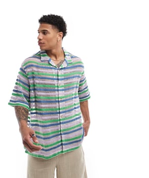 Shirts by ASOS DESIGN We like your style Stripe design Revere collar Button placket Drop shoulders Oversized, boxy fitSold By: Asos