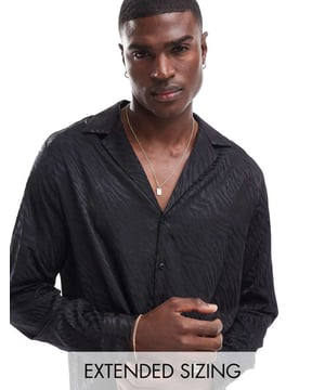 Shirts by ASOS DESIGN May cause compliments Revere collar Button placket Long sleeves Relaxed fitSold By: Asos