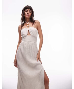 Dresses by Topshop This is Topshop Halterneck style Ring details Cut-out front Thigh-high split Regular fitSold By: Asos