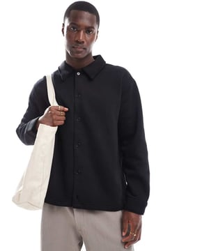 Shirts by Selected Homme May cause compliments Spread collar Button placket Long sleeves Buttoned cuffs Oversized fitSold By: Asos