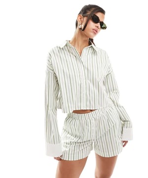 Tops by Kaiia Part of a co-ord set Shorts sold separately Stripe design Spread collar Button placket Long sleeves Regular fitSold By: Asos