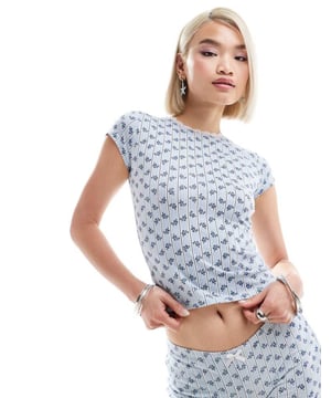 Tops by Motel Part of a co-ord set Shorts sold separately Floral design Crew neck Cap sleeves Slim fitSold By: Asos