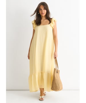 Maak je klaar om hoofden te laten omdraaien in onze Lemon Ruffle Short Sleeve Viscose Maxi Dress. Deze jurk is gemaakt van zachte en vloeiende viscosestof en heeft delicate ruches en een levendige citroenprint. Perfect voor een casual zomerdag of een avondje uit, deze maxi jurk houdt je koel en stijlvol.