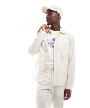 Suits by Jack & Jones You choose the occasion Stripe design Spread collar Button placket Chest pockets Regular fitSold By: Asos