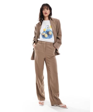 Trousers & Leggings by Vero Moda Part of a co-ord set Blazer sold separately Herringbone design Mid rise Belt loops Concealed fly Pockets to side and reverse Wide legSold By: Asos
