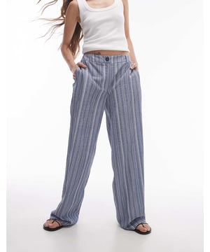 Trousers & Leggings by Topshop This is Topshop Low rise Belt loops Functional pockets Wide legSold By: Asos