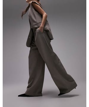 Trousers & Leggings by Topshop Welcome to the next phase of Topshop Waistcoat sold separately High rise Belt loops Side pockets Wide legSold By: Asos