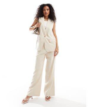 Trousers & Leggings by Vero Moda Part of a co-ord set Waistcoat sold separately High rise Elasticated waistband Side pockets Wide legSold By: Asos