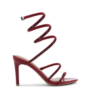 This KG Kurt Geiger Athena heel is crafted in a patent red leather alternative with red crystal embellished spiral ankle strap. The heel is in a high stiletto style. Heel height: 9cm.