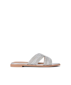 This KG Kurt Geiger Pose Sandal is a slip-on sandal with silver rope and crystal embellishment across the cut-out strap.