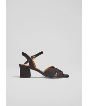 Embrace the season with elegance in the Alba cross front sandals. Crafted from black kid suede, these sandals feature  leather craftsmanship and a block heel. Ideal for date nights or cocktail parties, they pair effortlessly with tailored trousers or your favorite evening dress for a polished look.