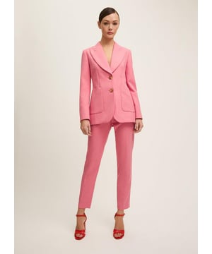 The Aimee Petite jacket is crafted from luxurious Portuguese fabric in a desert rose hue. This double-breasted design with metal crest buttons is tailored for those 5'3" and under. Pair with tailored trousers for an elegant office look, or jeans for a stylish weekend. Suitable for any occasion, it adds sophistication effortlessly.