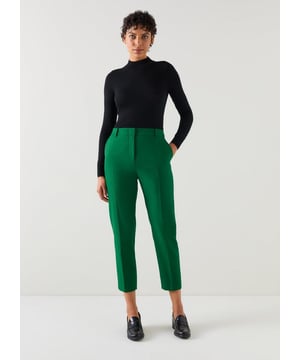 A great everyday trouser, our Mariner cigarette trousers make the perfect matching pair with our double-breasted jacket, or work beautifully with a lightweight knit. Crafted in Portugal from a versatile camel fabric, they sit on the waist with belt loops, have a front fastening, side pockets, centre creases and a slim, cropped cigarette cut. Wear them with the matching Mariner jacket and a pretty blouse for a relaxed take on spring tailoring.