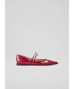 The 'Lulu' red dressy flats feature a multi-strap design in luxurious patent leather. Crafted in Spain, these flats offer quality and comfort. Versatile, they pair beautifully with smart casual outfits or skirts. Ideal for brunch, shopping, or date nights, they add sophistication to any occasion.