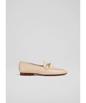 A chic everyday flat with a touch of elegance thanks to its gold snaffle detail, the Adalynn loafers are a new style in our spring collection. Crafted in Spain from butter-soft latte-hued nappa leather, they have  a round toe, classic loafer styling finished with a gold snaffle and a flat heel. Slip them on with tailored trousers and a pretty blouse. 