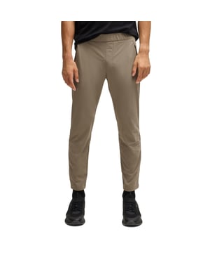 Mens BOSS T Basin Tapered-leg trousers in water-repellent stretch fabric in beigeThese BOSS Menswear tapered-fit trousers have adjustability at the waist and hems. Expand your wardrobe with this versatile pair crafted in stretch material with water repellency.- Elasticated waistband with inner drawcord- Zipped front pockets- Tapered leg- Snap buttons on hem- Technical 4-way stretch for maximum freedom of movement- Quick-dry  water-repellent and easy iron.- Main material: 90% Polyamide  10% Elastane.  Pocketing: 100% Polyester.  Machine washable.- Ref: 50529668-334
