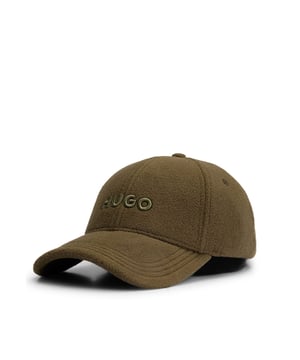 Mens HUGO Jake-FL Fleece Cap with embroidered logo in dark beigeA cosy cap by HUGO. Featuring an embroidered logo  this accessory is designed in soft fleece and trimmed with a branded silicone labelMain material: 100% Polyester.  Lining: 100% Polyester.  Hand wash onlyRef: 50524751-257
