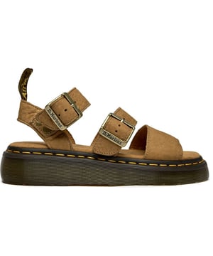 These tan nubuck sandals bring Dr. Martens' iconic edge to warm-weather wear. The Gryphon Quad features the brand's signature AirWair heel loop and side-stitched rubber sole for that unmistakable DM's construction. Branded buckles add industrial flair while the suede insole keeps comfort levels high. A fresh take on flat slides that maintains all the rebellious spirit you'd expect from the legendary bootmaker.