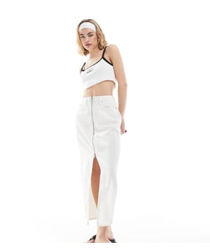Skirts by Calvin Klein Jeans  High rise Zip fastening Functional pockets Branded patch to reverse Front split Regular fitSold By: Asos