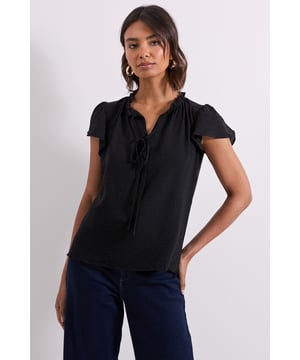 Feminine frill cap sleeves with delicate gathering detail
        Flattering V-neckline with tie front fastening
        Lightweight woven fabric for comfortable all-day wear
        Versatile silhouette that pairs with both casual and smart separates
        Subtle textured finish adds visual interest to this wardrobe staple
    
    This Dorothy Perkins top combines effortless style with practical comfort for your everyday wardrobe. The charming frill sleeves and tie-front detail create a softly feminine look that's perfect for various occasions. Style with wide-leg jeans and ankle boots for weekend brunches with friends, or tuck into a pencil skirt with ballet flats for family gatherings. The relaxed fit ensures comfort without sacrificing style, while the V-neckline offers a flattering frame for delicate jewellery. For casual outings, pair with your favourite denim and a crossbody bag, or dress up with tailored trousers and a structured blazer for more polished events. This versatile piece transitions seamlessly from day to evening, making it an essential addition to your capsule wardrobe that will serve you well through multiple seasons.