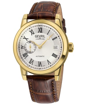 Just like a finely tailored suit or the smoothest of scotches, the Gevril Madison Collection stands as a testament to the unswerving allure of straightforward sophistication. Echoing the very spirit of Madison Avenue, this collection asserts the dominance of luxury through its bold 39mm round Stainless Steel Case, adorned with an Exhibition Back that beckons intrigue.

Uncompromising in style and presence, the Madison man is a force to be reckoned with – audacious, resolute, and undeniably masculine. Whether wrapped in the embrace of Italian leather or encased in the strength of a Stainless-Steel bracelet secured by an assertive deployment buckle, this collection exudes an aura that demands attention.

A true manifestation of precision, the Madison Collection proudly unveils an exclusive open-heart window, an insight into the intricate mechanics of Swiss Automatic movements. Beneath the anti-reflective Sapphire crystal, time is elevated beyond the mundane, becoming a dynamic interplay of power and sophistication. Crafted with a steadfast resolve, this timepiece stands tall, unruffled by the unexpected, fortified with water resistance up to 50 meters.

For the modern-day man of impact, the Madison Collection isn't just a watch; it's a statement of authority that resonates with every heartbeat. In a world where subtlety speaks volumes, this collection roars with masculinity, an emblem of unwavering confidence that doesn't merely mark the passage of time; it leaves an indelible mark on history. Gevril 2564 Men's Madison Swiss Automatic Watch

39mm Round 316L Stainless Steel IPYG Case, Gold Bezel, Silver Dial 
Date at 3 o'clock, Sub dial second hand at 9
Screw Down Crown
Brown Handmade Italian Leather Strap with deployment buckle
Anti-reflective Sapphire Crystal
Water Resistant to 50 Meters/5ATM
Swiss Automatic Movement  SA110
