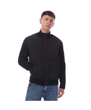 Mens Hugo Boss Kydalnrio Hybrid Jacket in black.- Funnel neck.- Full zip fastening.- Two front pockets.- Ribbed cuffs and hem.- Nylon front.- Square Boss badge on the chest.- Knitted.- 40% Acrylic  39% Virgin Wool  18% Polyamide  3% Elastane.- Ref: 50531494001