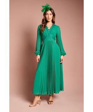 Elegant V-neckline adorned with delicate lace trim
        Intricate pleating detail across the bodice and skirt
        Flowing maxi length for a graceful silhouette
        Long, billowing sleeves with subtle gathering at the cuffs
        Flattering empire waistline accentuated by lace embellishment
    
    This stunning maxi dress from Coast is the epitome of sophistication and grace. Perfect for those special occasions where you want to make a lasting impression, whether it's a wedding, a day at the races, or a glamorous evening event. The crepe fabric drapes beautifully, creating a fluid and feminine shape that moves elegantly with every step. Style this showstopper with strappy metallic heels and a clutch bag for a polished look. For cooler evenings, drape a lightweight pashmina over your shoulders. Elevate your ensemble with statement earrings and a sleek updo to showcase the exquisite lace detailing at the neckline. This versatile piece can be dressed up or down, making it a valuable addition to your occasion wear wardrobe that you'll treasure for years to come.