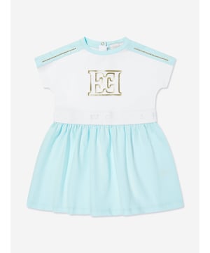 Introducing the Escada Baby Girls Logo Dress in White, the epitome of luxury for the littlest fashionistas. Crafted for SS2025, this designer piece elevates any baby girl's wardrobe to a splendid echelon. Key features include Elegant White Hue Pristine and classy, perfect for any occasion. Premium Fabric Exceptionally soft, ensuring all-day comfort. Iconic Logo Detail Subtly showcases the prestigious Escada brand, adding a touch of exclusivity. Timeless Design Combines modern trends with classic elegance.Upgrade her style with this exquisite dress from Escada. Buy now for a touch of luxury!