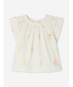 Introduce elegance to the nursery with the Baby Girls Alisia Blouse in Ivory by Bonpoint, crafted to enchant during SS2025. Exquisite Craftsmanship Tailored from premium fabrics for unmatched softness. Timeless Design Features delicate lace trim and subtle pleating for a classic touch. Versatile Chic Ivory hue ensures effortless pairing with any outfit.Cherish timeless moments in style with Bonpoint's luxurious blouse, a quintessential addition to her wardrobe.