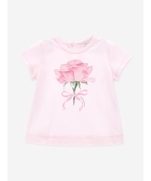 Monnalisa's dreamy Avant-Garde aesthetics are both charming and divine. This baby girls rosa fairy-tale short sleeve t-shirt is woven in soft and comfortable jersey. It has a rose print on the front for a romantic touch and a back button closure for easy dressing. Round Neck Straight Hem 100 Cotton