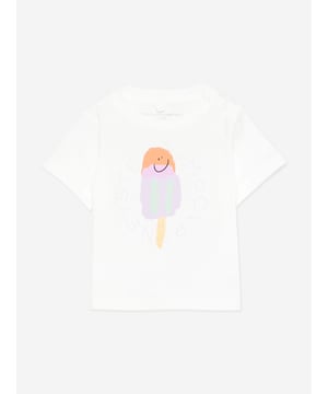 Stella McCartney inspire imagination and creative expression in their colourful designs. This baby girls ivory short sleeve t-shirt is woven from soft organic cotton jersey. It has a large print on the front of an ice cream with a smiling face in orange, purple and green. There is a purple logo print around the ice cream for extra charm. Round Neckline Narrow Ribbed Edge Two Push Buttons At the Left Shoulder Short Sleeves 100 Organic Cotton Rib 96 Organic Cotton 4 Elastane